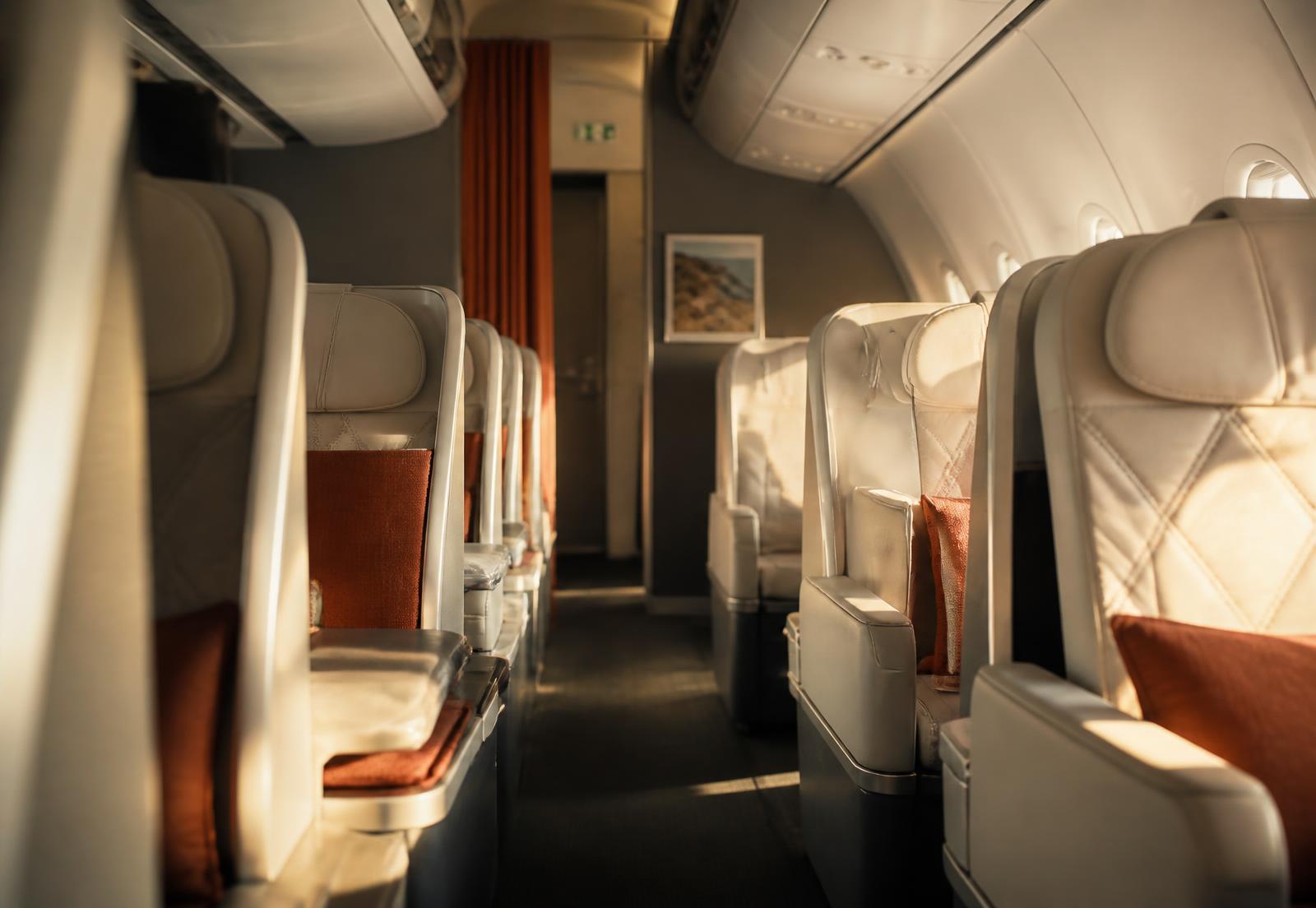 Warmly lit aircraft cabin interior